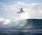 Flying surfing boy