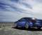 Blue Infiniti in the blue sky