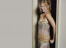 January Jones Smiling wallpaper