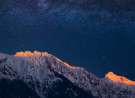 Glowing Alps under Milky Way wallpaper